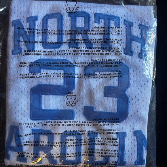 This is an authentic brand new Michael Jordan North Carolina Jumpman jersey. - Picture 1 of 3